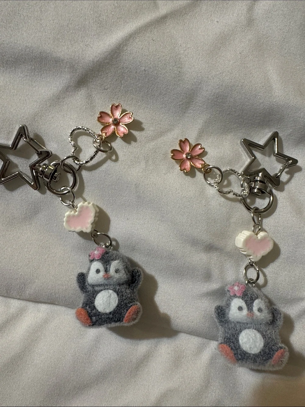 Source Unknown Gray Penguin Keychain Pair with Pink Flower Charms